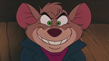 Movie still from “The Great Mouse Detective” (1986), directed by David Michener – A cartoon character's face with green eyes; Close Up shot, High angle