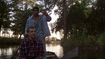 Movie still from “The Great Santini” (1979), directed by Lewis John Carlino – Two men on a boat in the water; Medium shot, Low angle