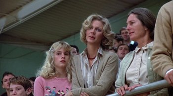 Movie still from “The Great Santini” (1979), directed by Lewis John Carlino – Two women and a girl in a crowd of people; Close Up shot, Low angle