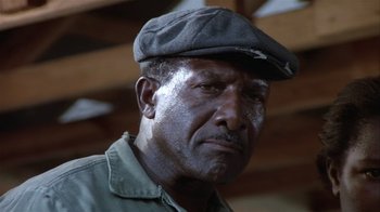 Movie still from “The Great Santini” (1979), directed by Lewis John Carlino – A person wearing a hat; Close Up shot, Low angle