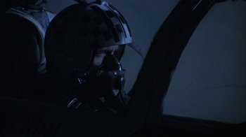 Movie still from “The Great Santini” (1979), directed by Lewis John Carlino – A man wearing a gas mask in the dark; Close Up shot, Low angle