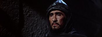 Movie still from “The Greatest Story Ever Told” (1965), directed by David Lean – A person wearing a helmet; Close Up shot, Low angle