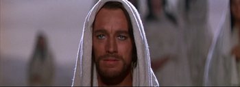Movie still from “The Greatest Story Ever Told” (1965), directed by David Lean – A person with a towel on his head; Close Up shot, Low angle