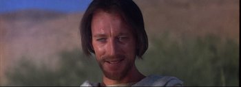 Movie still from “The Greatest Story Ever Told” (1965), directed by David Lean – A person with long hair and a beard; Close Up shot, Low angle