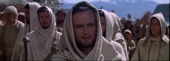 Movie still from “The Greatest Story Ever Told” (1965), directed by David Lean – A person with a towel on their head; Close Up shot, Low angle