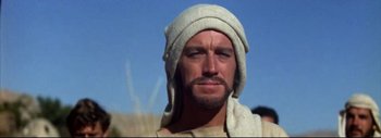 Movie still from “The Greatest Story Ever Told” (1965), directed by David Lean – A person with a towel on his head; Close Up shot, Low angle