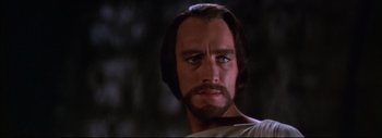 Movie still from “The Greatest Story Ever Told” (1965), directed by David Lean – A person with long hair and a beard; Close Up shot, Over the shoulder angle