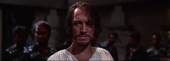 Movie still from “The Greatest Story Ever Told” (1965), directed by David Lean – A person with long brown hair; Close Up shot, High angle
