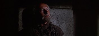 Movie still from “The Greatest Story Ever Told” (1965), directed by David Lean – An old man with a long beard looking up at the sky; Close Up shot, Low angle