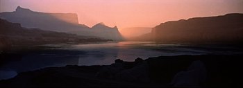 Movie still from “The Greatest Story Ever Told” (1965), directed by David Lean – A view of a body of water with mountains in the background; Extreme Wide shot, Low angle
