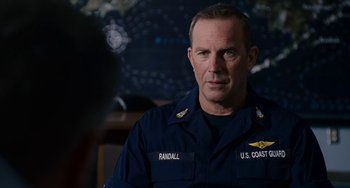 Movie still from “The Guardian” (2006), directed by Andrew Davis – A person wearing a uniform; Close Up shot, Over the shoulder angle