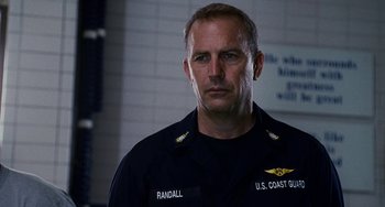 Movie still from “The Guardian” (2006), directed by Andrew Davis – A person wearing a military uniform; Close Up shot, Low angle