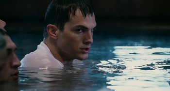 Movie still from “The Guardian” (2006), directed by Andrew Davis – A man in the water with his head above the water; Close Up shot, High angle