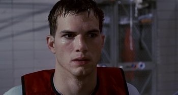 Movie still from “The Guardian” (2006), directed by Andrew Davis – A young man's face with water droplets on his face; Close Up shot, Low angle