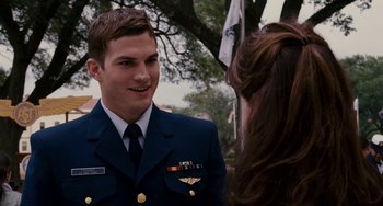 Movie still from “The Guardian” (2006), directed by Andrew Davis – A man in a uniform talking to a woman in a uniform; Medium shot, Over the shoulder angle