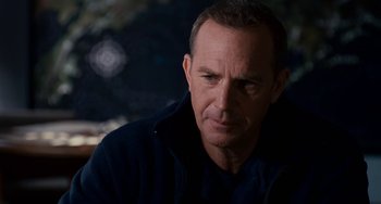 Movie still from “The Guardian” (2006), directed by Andrew Davis – A person wearing a jacket; Close Up shot, Over the shoulder angle