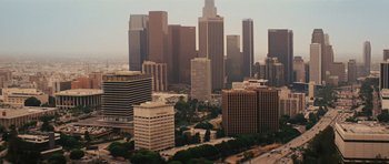Movie still from “The Guilt Trip” (2012), directed by Anne Fletcher – An aerial view of a city with skyscrapers; Extreme Wide shot, High angle