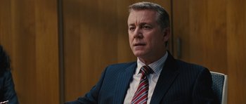 Movie still from “The Guilt Trip” (2012), directed by Anne Fletcher – A person wearing a suit and tie; Close Up shot, Over the shoulder angle