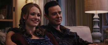 Movie still from “The Guilt Trip” (2012), directed by Anne Fletcher – A man and a woman sitting next to each other on a couch; Close Up shot, Over the shoulder angle