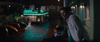 Movie still from “The Guilt Trip” (2012), directed by Anne Fletcher – A man standing on the side of a road at night; Medium shot, Low angle