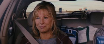 Movie still from “The Guilt Trip” (2012), directed by Anne Fletcher – A person sitting in a car; Close Up shot, Over the shoulder angle