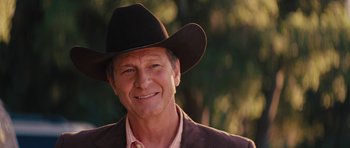 Movie still from “The Guilt Trip” (2012), directed by Anne Fletcher – A person wearing a cowboy hat; Close Up shot, Low angle