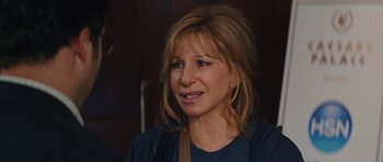 Movie still from “The Guilt Trip” (2012), directed by Anne Fletcher – A person wearing a blue shirt; Close Up shot, Over the shoulder angle