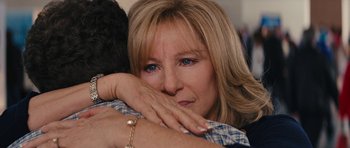 Movie still from “The Guilt Trip” (2012), directed by Anne Fletcher – A person hugging another person; Close Up shot, Over the shoulder angle