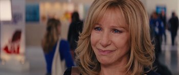 Movie still from “The Guilt Trip” (2012), directed by Anne Fletcher – A person with long blonde hair; Close Up shot, Over the shoulder angle