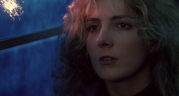 Movie still from “The Handmaid's Tale” (1990), directed by Volker Schlöndorff – A person with long hair; Close Up shot, Low angle