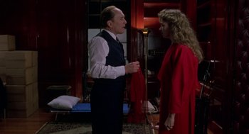 Movie still from “The Handmaid's Tale” (1990), directed by Volker Schlöndorff – A man and a woman talking in a living room; Medium shot, Over the shoulder angle