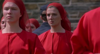 Movie still from “The Handmaid's Tale” (1990), directed by Volker Schlöndorff – A group of people dressed up in red; Close Up shot, High angle