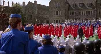 Movie still from “The Handmaid's Tale” (1990), directed by Volker Schlöndorff – A group of people standing in front of a large building; Extreme Wide shot, High angle