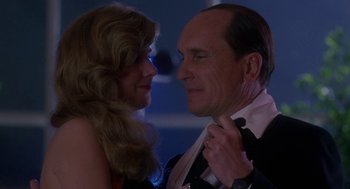 Movie still from “The Handmaid's Tale” (1990), directed by Volker Schlöndorff – A man and a woman looking at each other; Close Up shot, Low angle