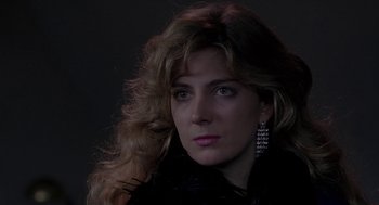 Movie still from “The Handmaid's Tale” (1990), directed by Volker Schlöndorff – A person with long hair; Close Up shot, Low angle