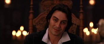 Movie still from “The Haunted Mansion” (2003), directed by Rob Minkoff – A person with long hair; Close Up shot, Over the shoulder angle