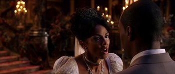 Movie still from “The Haunted Mansion” (2003), directed by Rob Minkoff – A woman with a tiara on her head; Close Up shot, Over the shoulder angle