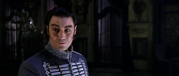Movie still from “The Haunted Mansion” (2003), directed by Rob Minkoff – A man wearing a uniform and looking at the camera; Close Up shot, Low angle