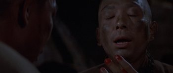 Movie still from “The Hawaiians” (1970), directed by Tom Gries – A man with red fingernails is laying on a bed; Close Up shot, High angle