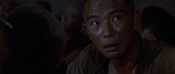 Movie still from “The Hawaiians” (1970), directed by Tom Gries – A person looking at the camera; Close Up shot, Over the shoulder angle