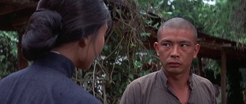 Movie still from “The Hawaiians” (1970), directed by Tom Gries – A man and a woman are talking outside; Close Up shot, Over the shoulder angle