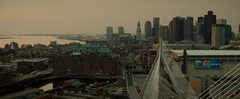 Movie still from “The Heat” (2013), directed by Paul Feig – A view of a city from a skyscraper; Extreme Wide shot, High angle