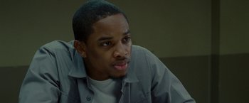 Movie still from “The Heat” (2013), directed by Paul Feig – A person wearing a shirt; Close Up shot, Over the shoulder angle