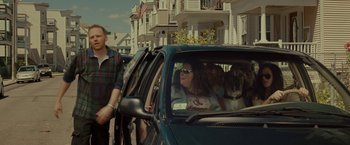 Movie still from “The Heat” (2013), directed by Paul Feig – A woman and a dog in the back of a car; Medium shot, Over the shoulder angle
