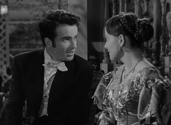Movie still from “The Heiress” (1949), directed by William Wyler – A man and a woman talking to each other; Medium shot, Over the shoulder angle
