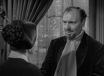 Movie still from “The Heiress” (1949), directed by William Wyler – A man and a woman talking in front of a mirror; Close Up shot, Over the shoulder angle