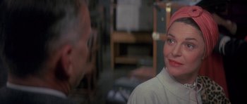 Movie still from “The Hindenburg” (1975), directed by Robert Wise – A man and a woman are talking in a room; Close Up shot, Over the shoulder angle