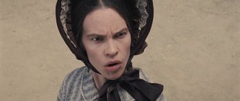 Movie still from “The Homesman” (2014), directed by Tommy Lee Jones – A person wearing a hat; Close Up shot, High angle