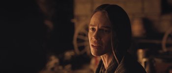 Movie still from “The Homesman” (2014), directed by Tommy Lee Jones – A person wearing a shirt; Close Up shot, Over the shoulder angle