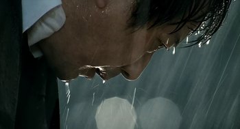 Movie still from “The Host” (2006), directed by Bong Joon Ho – A man with his head in the water; Extreme Close Up shot, Low angle